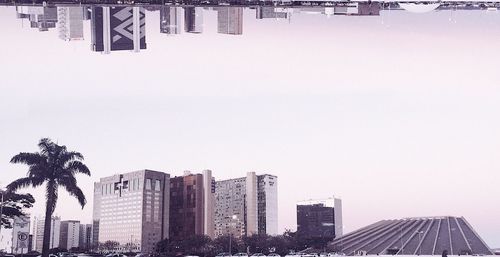 Cityscape against clear sky during winter