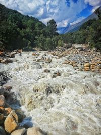 Scenic view of river against sky