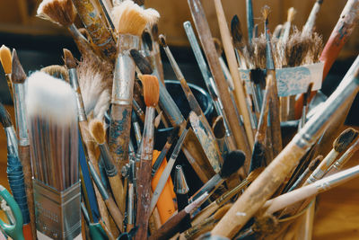 Close-up of paintbrushes on table