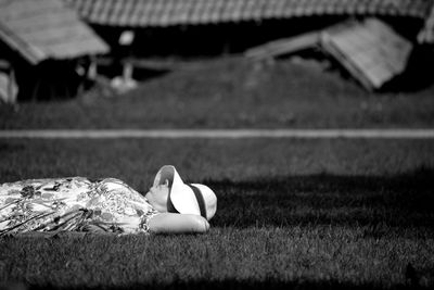 Couple lying on field