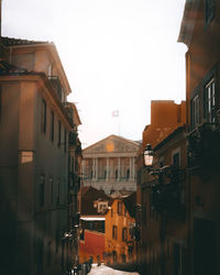 Buildings in city against sky