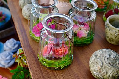 High angle view of various flowers in jar on table