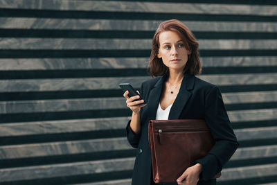 Young woman using mobile phone