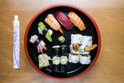 Directly above shot of sushi served on table