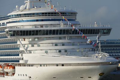 Flags hanging on cruise ship