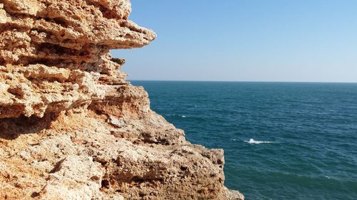 Scenic view of sea against clear sky