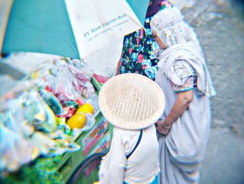 Rear view of woman wearing hat