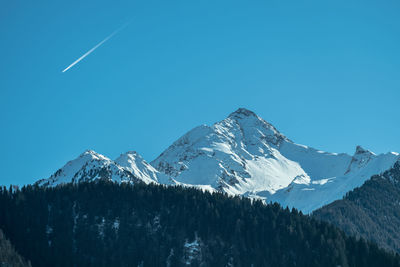 Snow covered mountain against sky