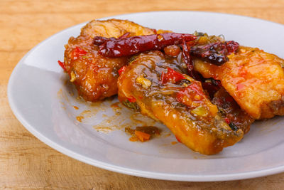 Close-up of meat in plate on table