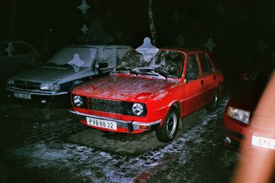 Abandoned toy car in city during winter