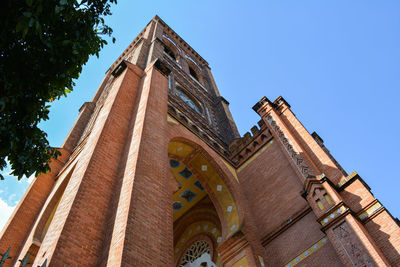 Low angle view of historic building against clear sky