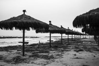 Scenic view of beach against sky during winter