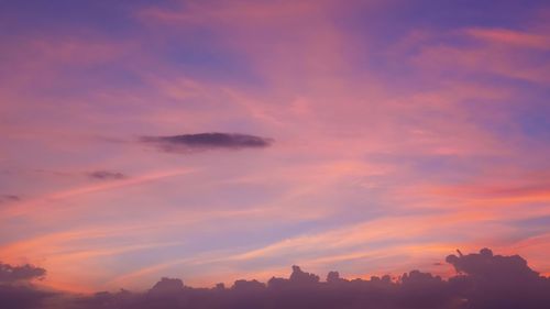 Low angle view of dramatic sky during sunset