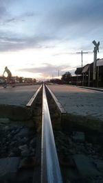 View of road against cloudy sky