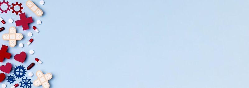 Low angle view of balloons against blue sky