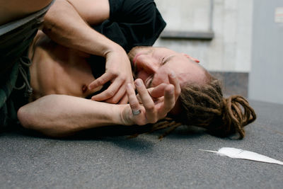 Man lying on floor