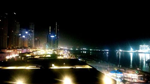 Illuminated cityscape at night
