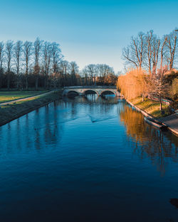 Bridge over river against sky