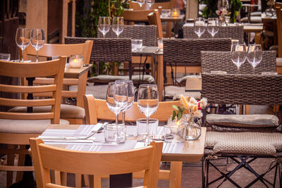 Empty chairs and tables at restaurant