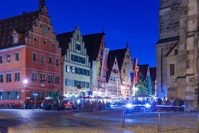 Illuminated buildings in city at night