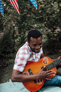 Young man playing guitar