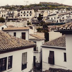 High angle view of residential buildings in city