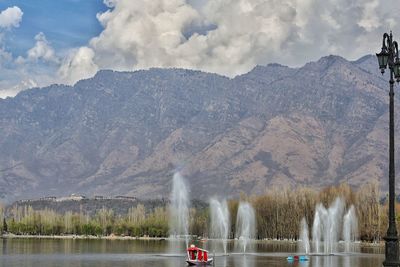 Panoramic view of lake against cloudy sky