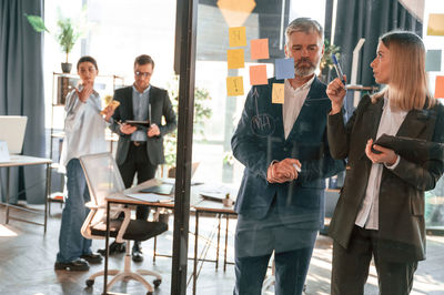 Business colleagues working in office