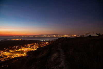 Open night view of the city and the river. 