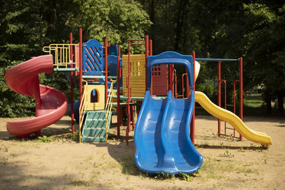 Children's playground in yard. place for children to play. carousels and slides. entertainment area.