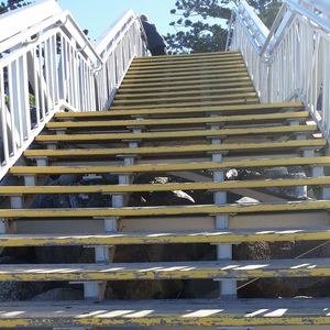 Staircase against sky in city