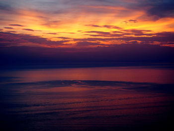 View of calm sea at sunset