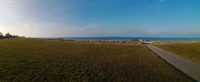 Scenic view of beach against sky