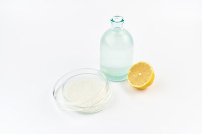 High angle view of drink in bottle against white background