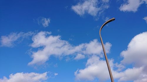 Low angle view of street light against sky