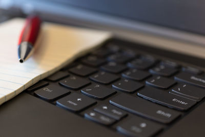 Close-up of computer keyboard on table