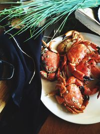 Close-up of seafood in plate on table