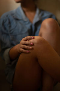 Young woman showing smooth silky skin legs