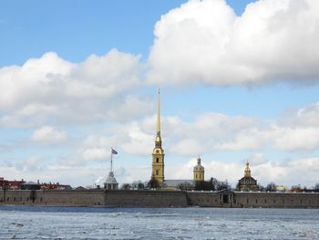 Buildings in city against sky