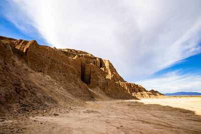 Rock formations on mountain against sky
