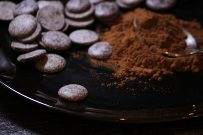 High angle view of chocolate cake on pebbles