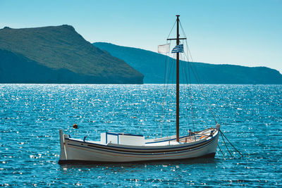 Traditional greek fishing boat in the aegean sea, greece.