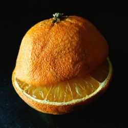 Close-up of orange fruit on table