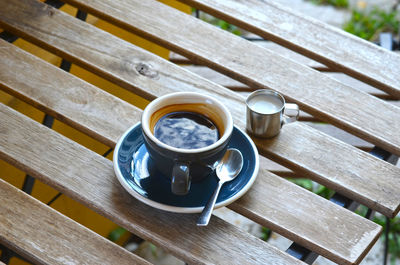 High angle view of black coffee on table