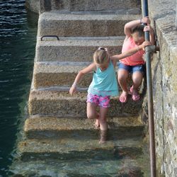Down the steps to the water - sisters