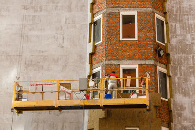 Thermal insulation of a house wall on a building site