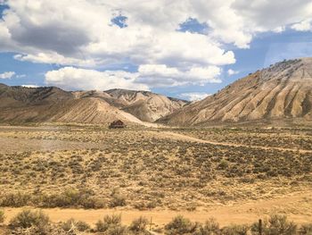 Scenic view of desert against sky