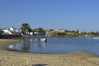Boats in calm blue sea