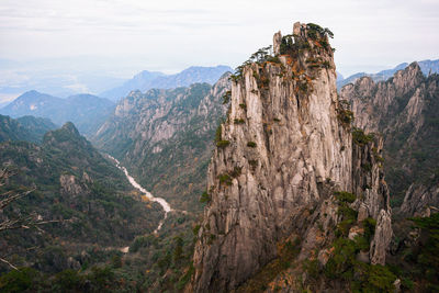 Scenic view of rocky mountains against sky