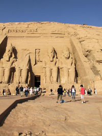 Group of people in front of a historical building